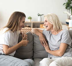 Ladies converse on couch