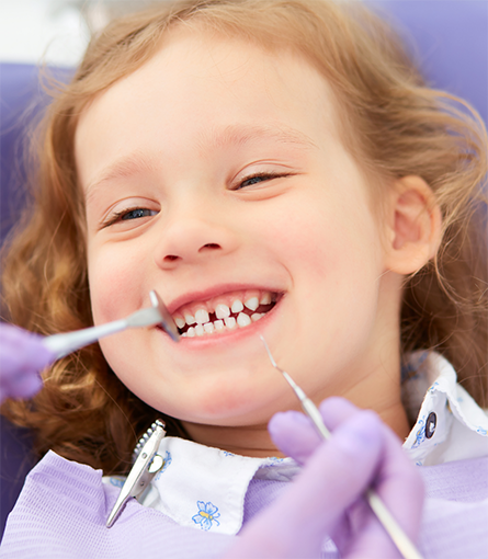 Close up of young child during dental checkup