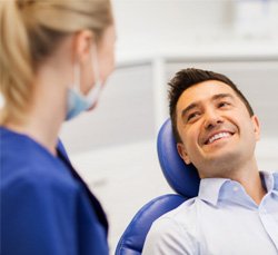 Man smiling in dental chair